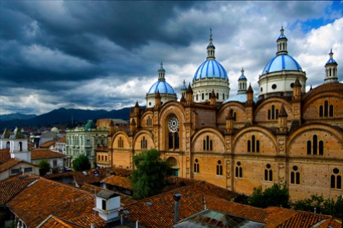 Cuenca / Ecuador / Dramatic Andean sky outlines the sky blue domes of the Cathedral of the Immaculate Conception.